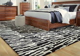 Bay Furniture Gallery - Ashley Furniture - Bramshaw Rug - 5' x 7' Rug / Black/Ivory - R406762